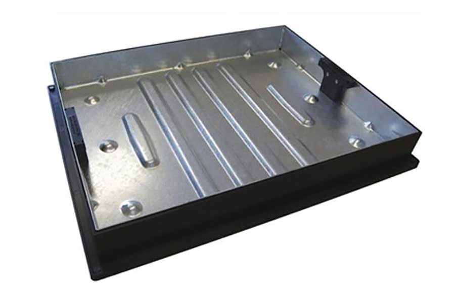 Heavy duty recessed manhole cover for use with slabs and block paving