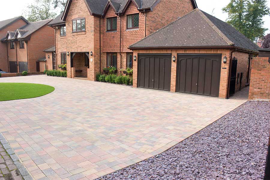 This large driveway and smart low maintenance landscaping give this house lots of kerb appeal