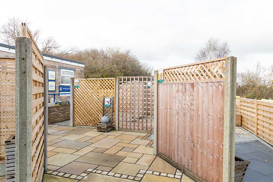 Displays of wooden fence panels and trellis in a range of styles at the AWBS branch display area in Oxford