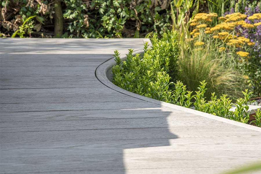 Decked walkway created with Composite Prime Redux Smoke grey composite decking boards
