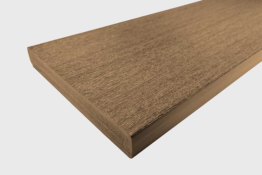 Detail image of a dark wood effect composite decking board
