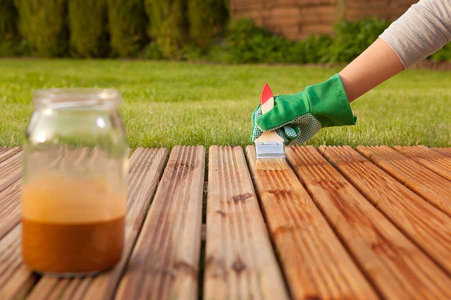 Staining and caring for traditional timber decking