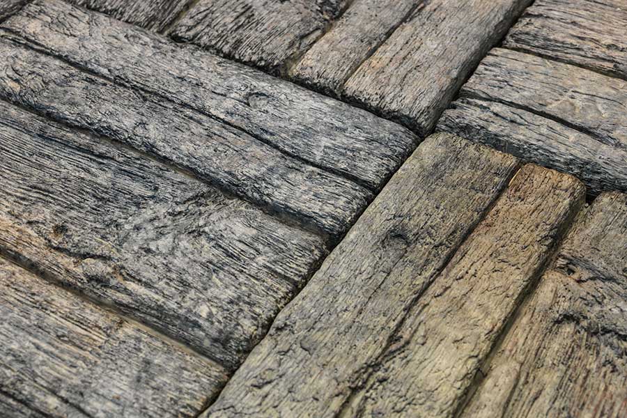 Surface detail of Timberstone rustic wood effect concrete paving