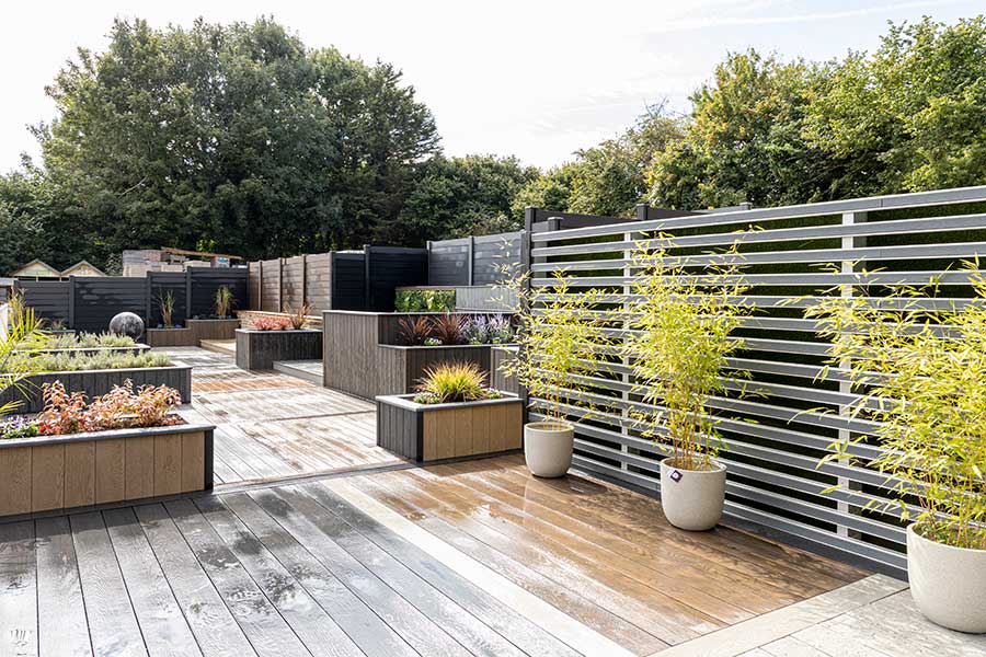 Composite garden products have been used to create this large deck and garden at AWBS in Oxford