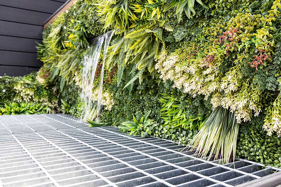 Artificial living wall with water fall feature on display at AWBS Oxford