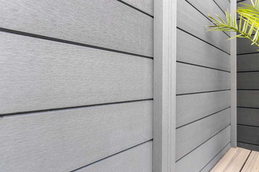 Trex composite wood effect post and panel fencing system in grey
