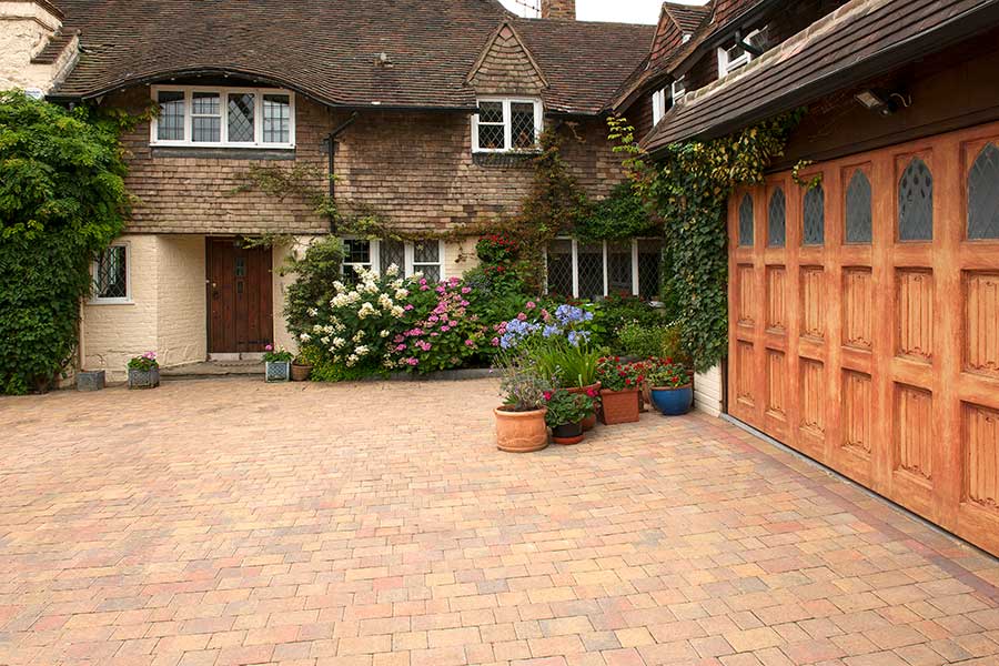 Large house with Brett Regatta Trio block paving