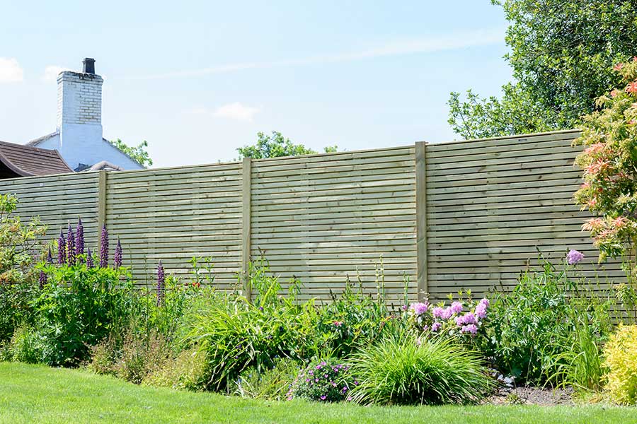 Smart new garden fence featuring Grange contemporary fence panels