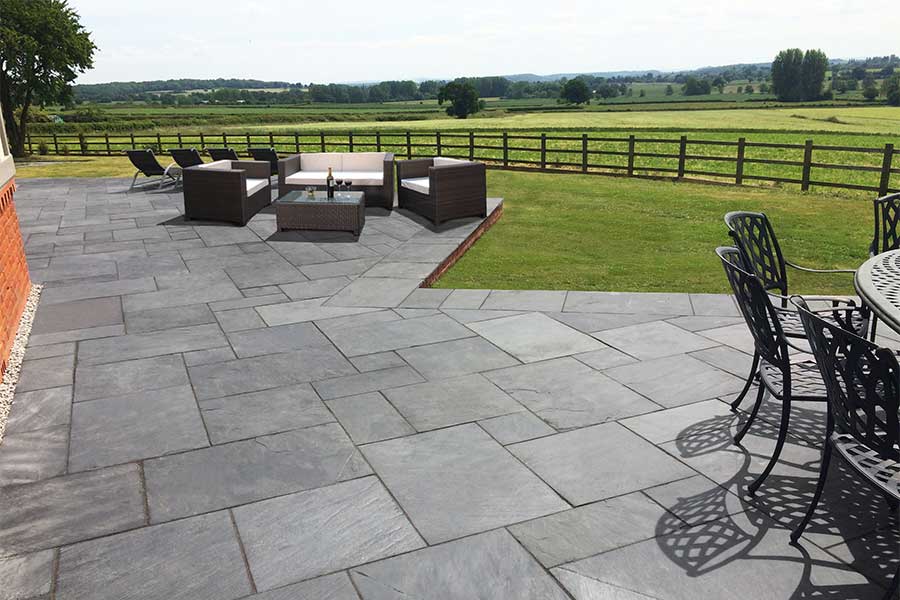 Large new patio paved with AWBS Exclusive Blue Slate paving