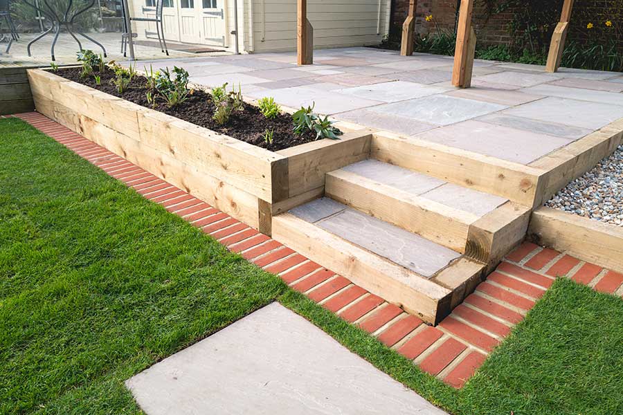 Raised planters made with new garden sleepers
