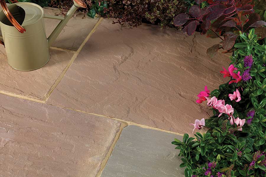 Natural stone paving with fresh paving grout