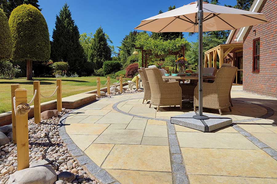 New patio featuring Pavestone Abbey limestone paving slabs