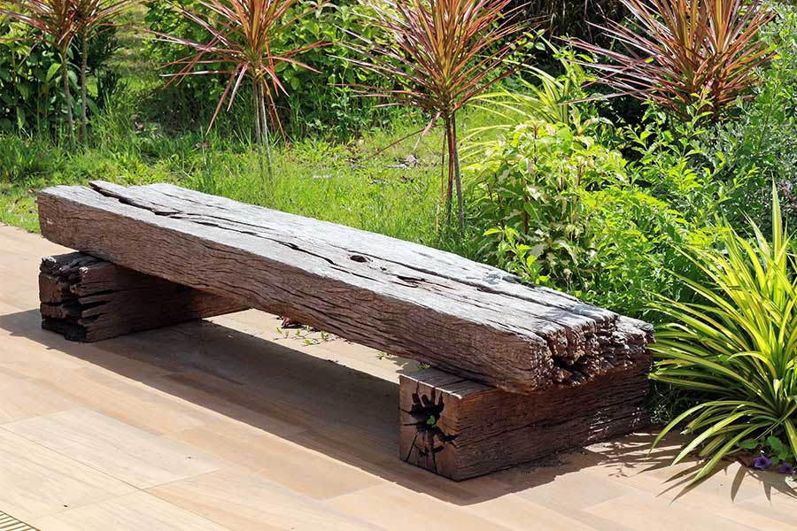Reclaimed railway sleeper used to create a funky rustic garden bench