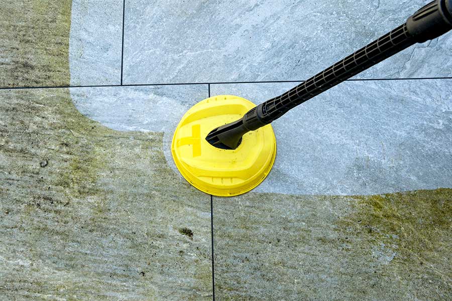 Cleaning porcelain paving with a pressure washer